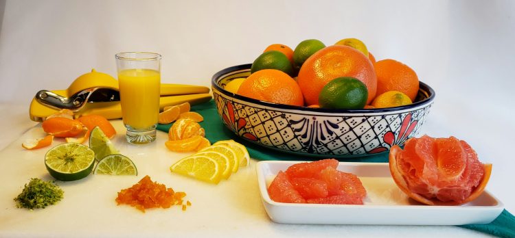 Best 3 ways to maximize your citrus. A beautiful display of assorted citrus and its many possible forms - grapefruit, lemons, limes, oranges are all shown as segments, slices juice, candied peels and zest.