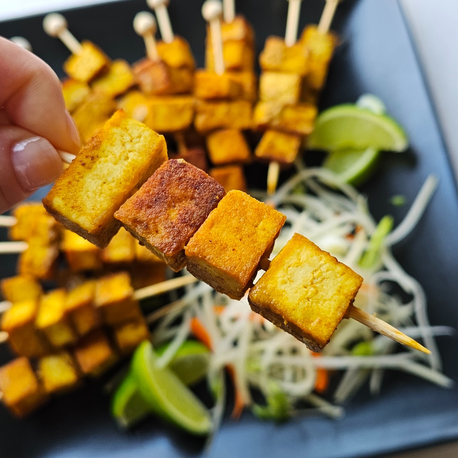 If you're in an appetizer rut like I was, this recipe for Easy Coconut Curry Tofu 2 Ways is a quick and delicious way to change up your appetizer routine. 

Extra firm tofu is cubed, fried in peanut oil until crispy. At this stage, you can season with salt, pepper, or any other seasoning that you like, but to make these crispy tofu bites into a fun and delicious appetizer, simply toss them in a simple sauce made from light coconut milk and yellow curry paste, skewer them, and watch them disappear. 

Even the carnivores in your family will be gobbling up these tasty cubes of goodness!

Get the recipe 👇👇👇
https://mostlybakes.com/easy-coconut-curry-tofu-2-ways/

 #tofurecipes #plantbasedrecipes #littletreats #foodblogger #foodie