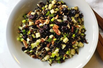 a close-up of the ingredients in this wild rice harvest salad