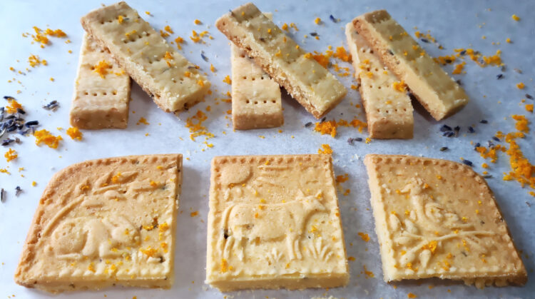 Lined up like soldiers, these Easy 7-Ingredient Orange Lavender Shortbread cookies have orange zest and dried lavender blossoms in each bite.