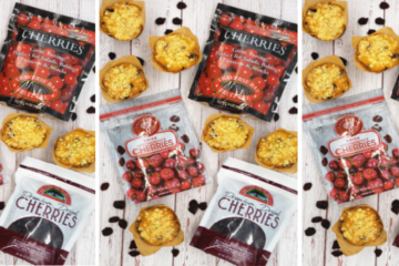 Fresh baked Authentic Montmorency cherry lime streusel muffins, dried Montmorency tart cherries and bags of dried cherries stretch across a distressed, whitewashed board.