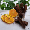 Tempting 2-Step Chocolate Orange Biscotti are displayed on a cutting board.