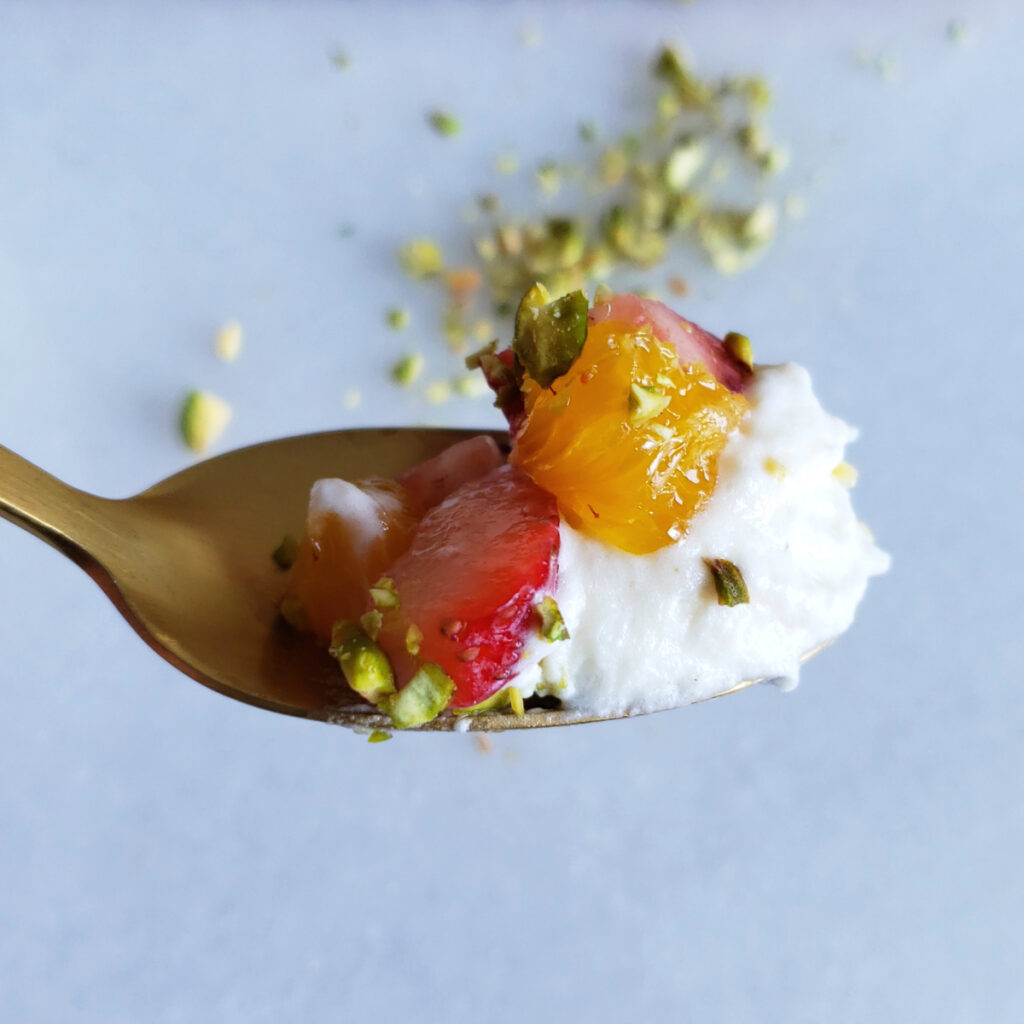 A closeup shot of a spoonful of Heavenly White Chocolate Mousse demonstrates its light texture.