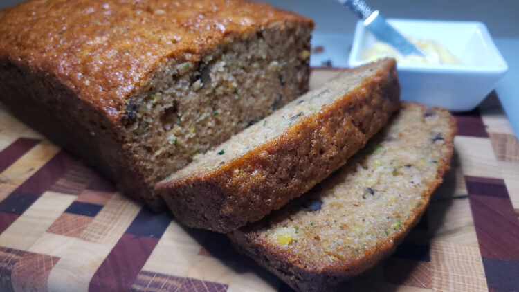 Three slices of this fresh baked loaf of Best Old Fashioned Zucchini Bread in 60 Minutes reveal a moist crumb with lots of zucchini, nuts and pineapple in every bite.