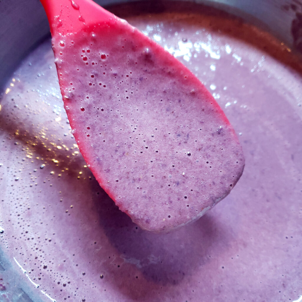 The batter for this Stunning 8-Ingredient Purple Sweet Potato Pie is creamy in texture like a pumpkin pie, and a vibrant purple. 