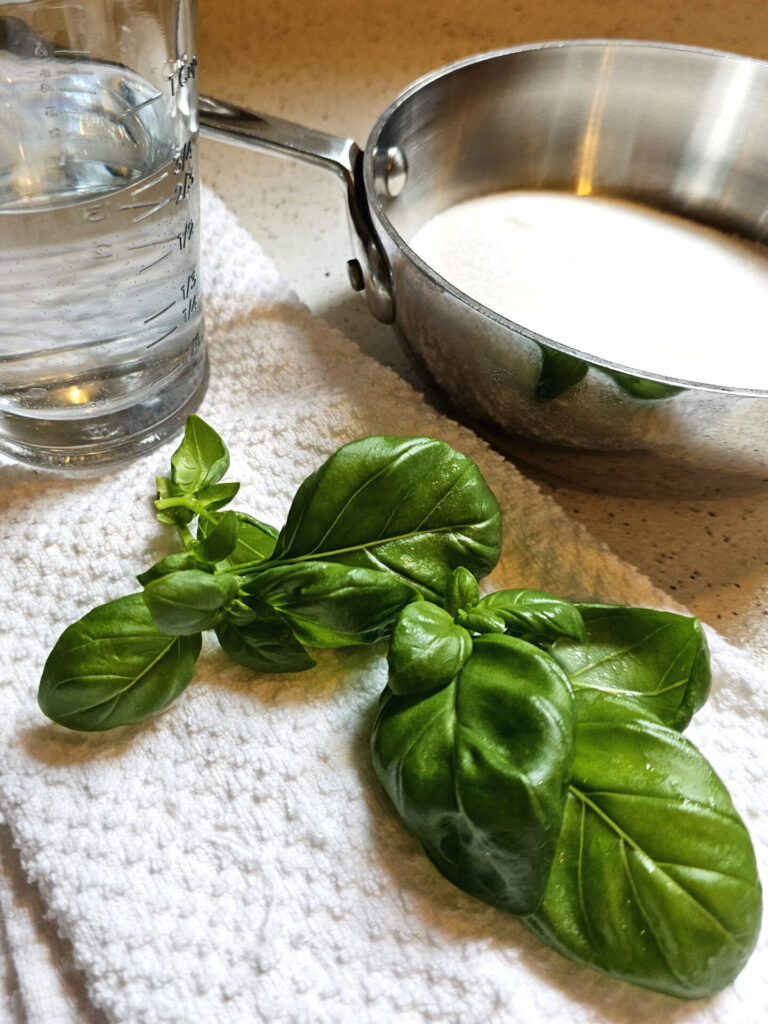 A basil-infused simple syrup sweetens this Easy 4-Ingredient Strawberry Basil Sorbet