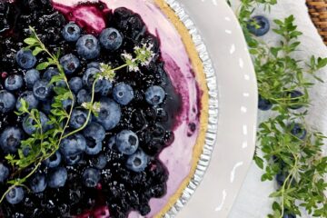 Swirls of homemade blueberry jam in a lime cheesecake filling and graham cracker crumb crust make up this irresistible Blueberry Lime No Bake Cheesecake.