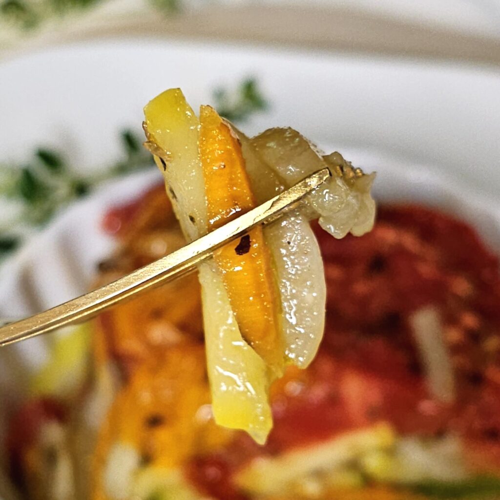 Layers of seasonal summer vegetables are featured in this Easy 6-Layer Summer Vegetable Bake recipe.
