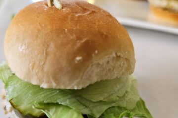 A platter full of Yum Yum Furikake Chicken Sliders are ready to be consumed.