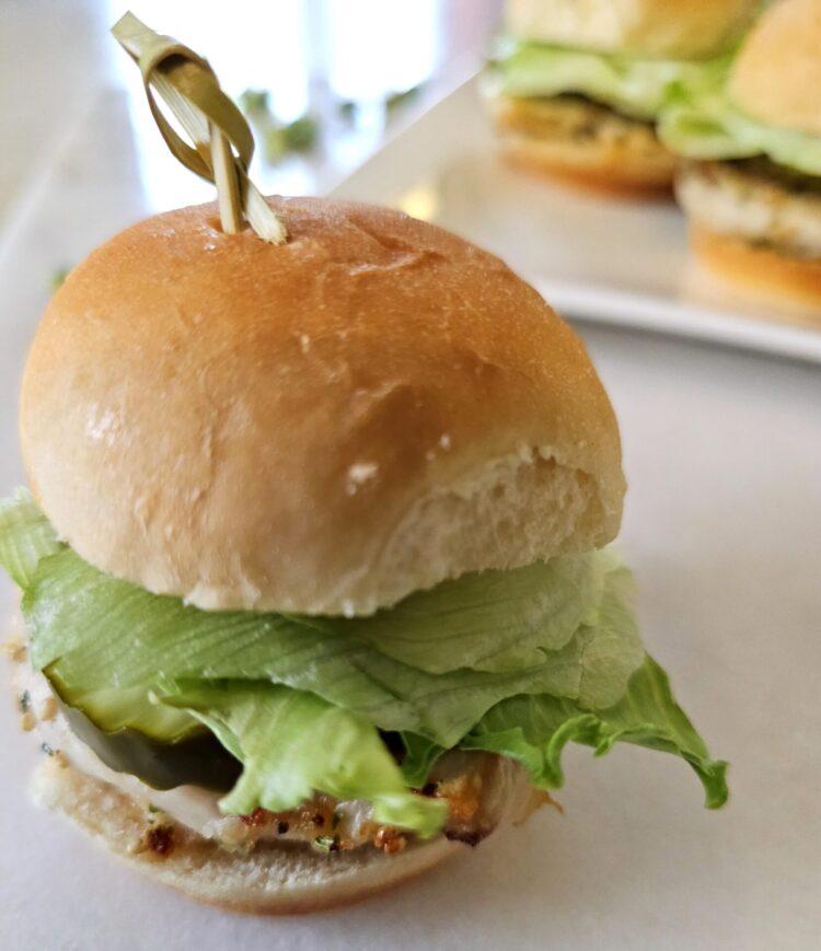 A platter full of Yum Yum Furikake Chicken Sliders are ready to be consumed.