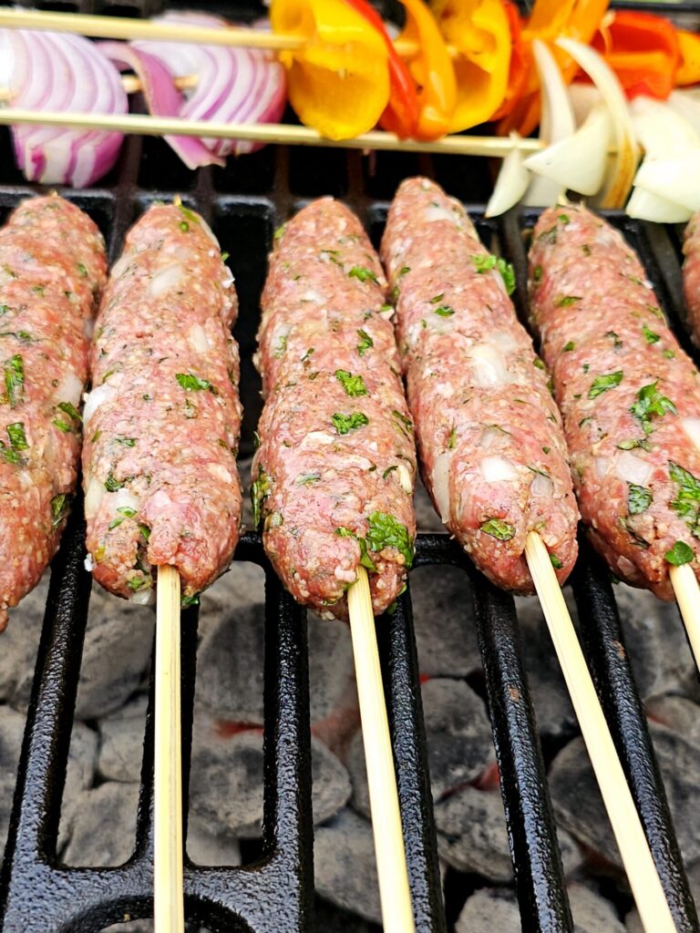 Grilled kebabs and vegetables to serve with this Irresistible 30-Minute Lebanese Kafta.