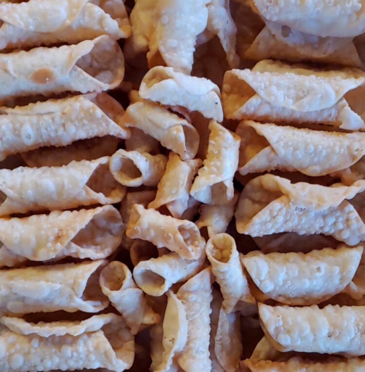 A large tray of Authentic Sicilian Cannoli Shells.